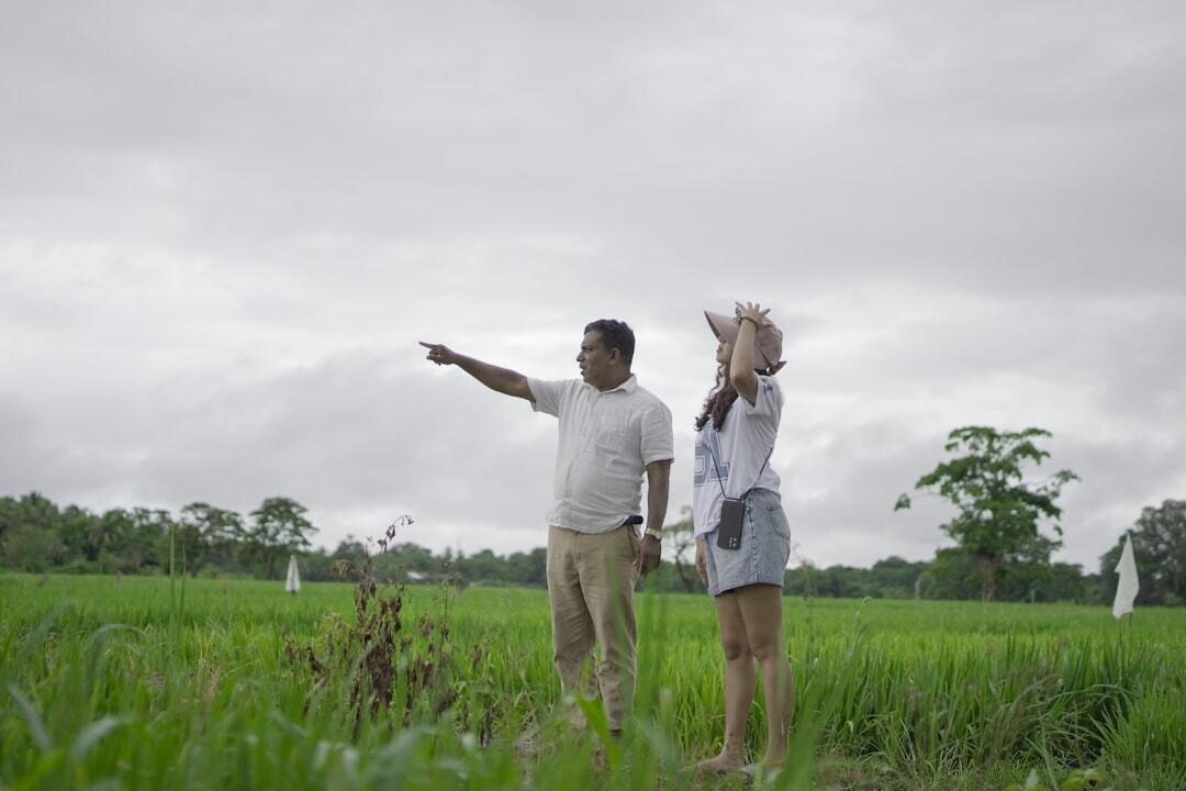 farmer telling story in field