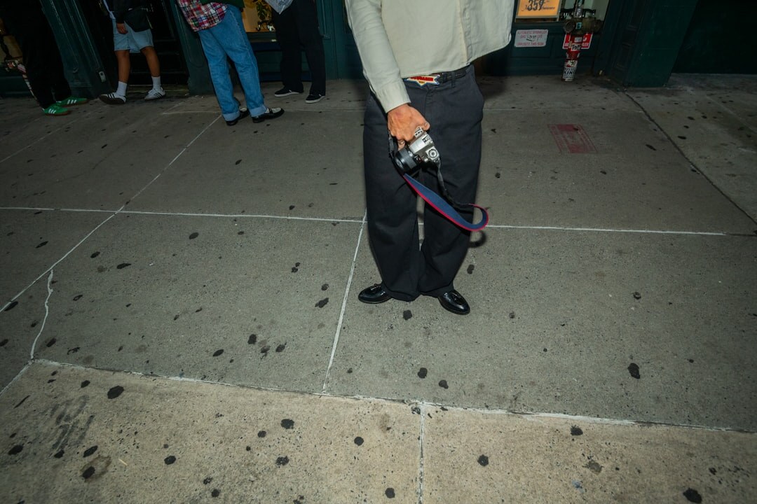 photographer capturing street scene